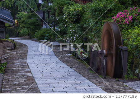 Japan: The stone-paved slopes and streetscape of Magome-juku, a post town on the Nakasendo road in Nakatsugawa City, Gifu Prefecture, at dusk 117777189