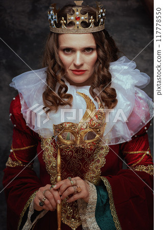 insidious medieval queen in red dress with venetian mask insidious medieval queen in red dress with venetian mask 117778550