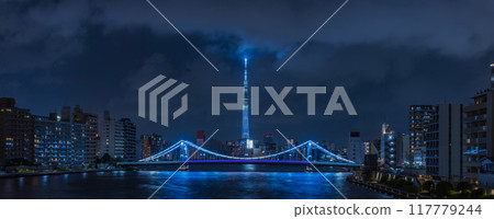 Night view from the Sumida River Bridge in Chuo Ward, Tokyo, Japan, with the illuminated Tokyo Skytree and Kiyosu Bridge Night view from the Sumida River Bridge in Chuo Ward, Tokyo, Japan, with the illuminated Tokyo Skytree and Kiyosu Bridge 117779244