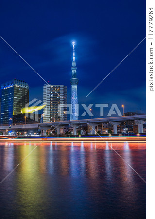 Night view along the Sumida River in Asakusa, Taito Ward, Tokyo, Japan, and the illuminated Tokyo Skytree 117779263