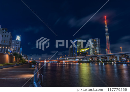 Night view along the Sumida River in Asakusa, Taito Ward, Tokyo, Japan, and the illuminated Tokyo Skytree 117779266