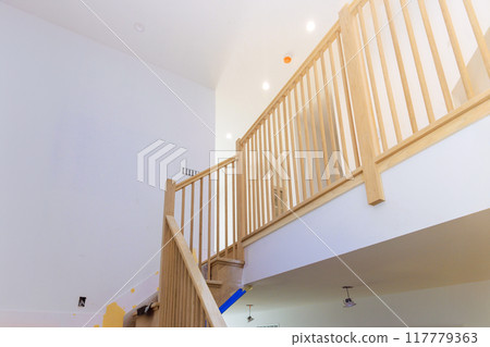 Wooden handrails as well railings stairs with in new house are designed classic style 117779363