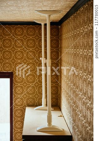 Shoe cabinet with tension rod to prevent tipping over 117780015