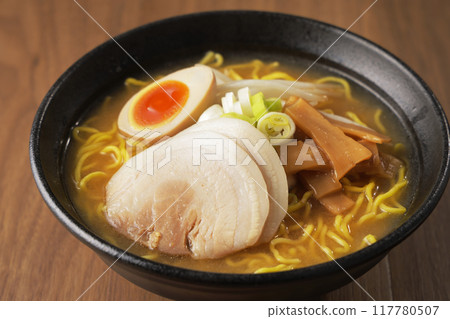 Miso ramen topped with boiled egg and roasted pork Miso ramen topped with boiled egg and roasted pork 117780507