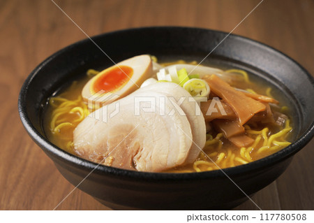Miso ramen topped with boiled egg and roasted pork Miso ramen topped with boiled egg and roasted pork 117780508