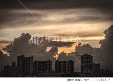 Silhouette view of Modern high-rise buildings and background of Dramatic sky in the city of Bangkok. 117781106