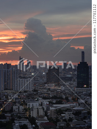 View of Beautiful Clouds in the Sky over Large Metropolitan City. View of Beautiful Clouds in the Sky over Large Metropolitan City. 117781112
