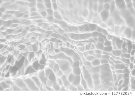 Abstract white transparent water shadow surface texture natural ripple background 117782054