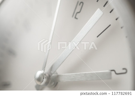 close up of silver metal clock 117782691
