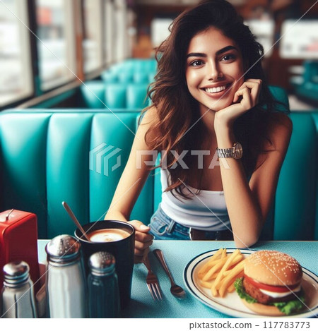 Woman eating a burger in an American diner 117783773