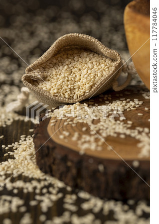 white sesame seeds for use in cooking 117784046