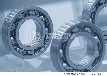 Close up scene the ball bearing parts in the light blue scene. Close up scene the ball bearing parts in the light blue scene. 117784336