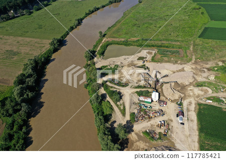Aerial view of river sand and gravel exploitation, pit, quarry, ballast 117785421