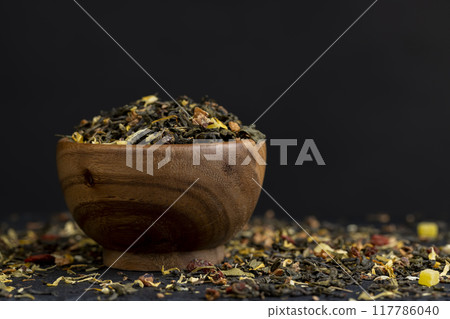 green leaf tea mixed with rose and jasmine flowers green leaf tea mixed with rose and jasmine flowers 117786040
