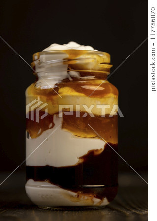 natural yogurt in a glass jar with fruits natural yogurt in a glass jar with fruits 117786070