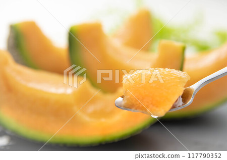 Fresh, sweet and delicious melons harvested from the field Fresh, sweet and delicious melons harvested from the field 117790352