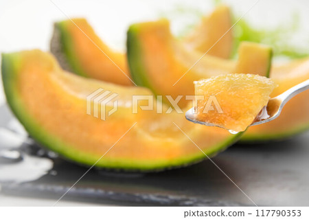 Fresh, sweet and delicious melons harvested from the field Fresh, sweet and delicious melons harvested from the field 117790353
