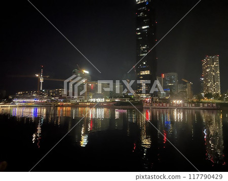 Night view to the bridge and night city over the river in Vienna, Austria Night view to the bridge and night city over the river in Vienna, Austria 117790429