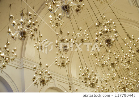 Blank porch with barrel arches and hanging chandeliers Blank porch with barrel arches and hanging chandeliers 117790445