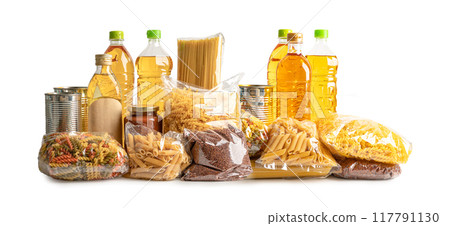 Foodstuff for donation, storage and delivery. Various food, pasta, cooking oil and canned food in cardboard box. 117791130