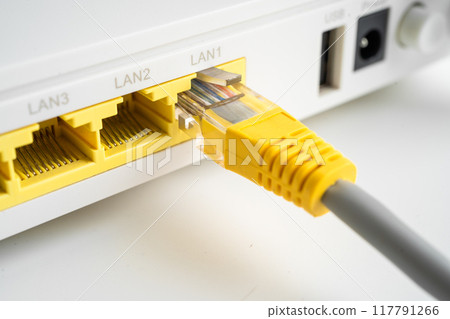 Ethernet cable with wireless router connect to internet service provider internet network. Ethernet cable with wireless router connect to internet service provider internet network. 117791266