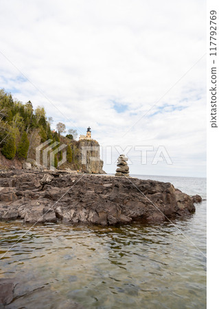 A beautiful view of Split Rock Lighthouse on the rocky coast of Lake Superior. A beautiful view of Split Rock Lighthouse on the rocky coast of Lake Superior. 117792769