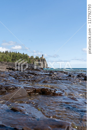 A beautiful view of Split Rock Lighthouse on the rocky coast of Lake Superior. A beautiful view of Split Rock Lighthouse on the rocky coast of Lake Superior. 117792793