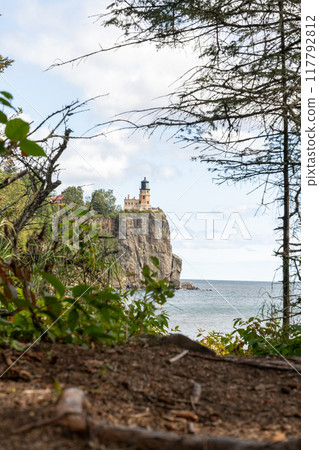 A beautiful view of Split Rock Lighthouse on the rocky coast of Lake Superior. 117792812