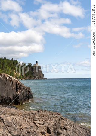 A beautiful view of Split Rock Lighthouse on the rocky coast of Lake Superior. A beautiful view of Split Rock Lighthouse on the rocky coast of Lake Superior. 117792813