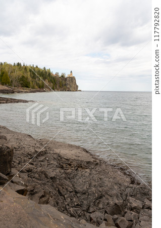 A beautiful view of Split Rock Lighthouse on the rocky coast of Lake Superior. 117792820