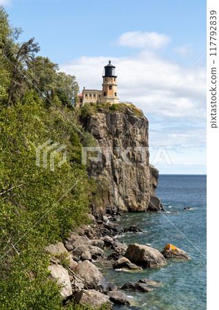 A beautiful view of Split Rock Lighthouse on the rocky coast of Lake Superior. 117792839