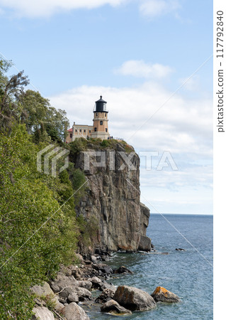 A beautiful view of Split Rock Lighthouse on the rocky coast of Lake Superior. 117792840
