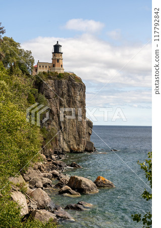 A beautiful view of Split Rock Lighthouse on the rocky coast of Lake Superior. A beautiful view of Split Rock Lighthouse on the rocky coast of Lake Superior. 117792842