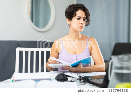 Happy female student study, reading book 117794188