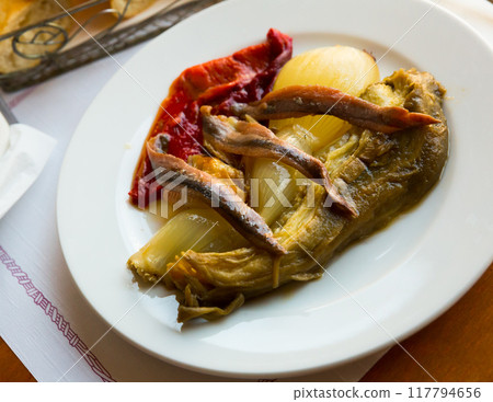 Spanish dish Escalivada con anchoas 117794656
