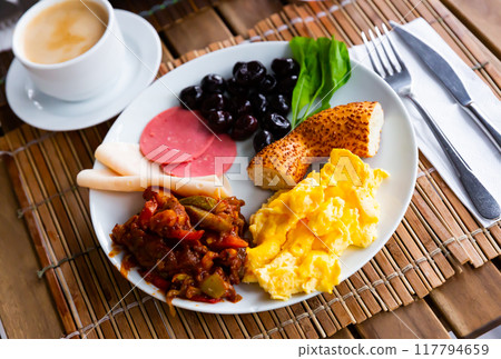 Rich and delicious Turkish breakfast on hotel table without people 117794659