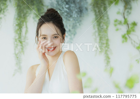 Young woman in wedding dress Young woman in wedding dress 117795775