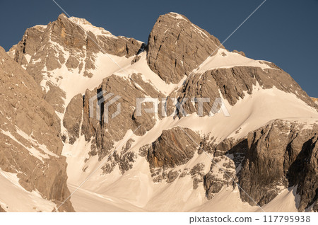 Beautiful view of Jade Dragon Snow Mountain (or Mt.Yulong) during sunrise. This mountains located in Yulong Naxi Autonomous County, Lijiang, in Yunnan province, China. 117795938