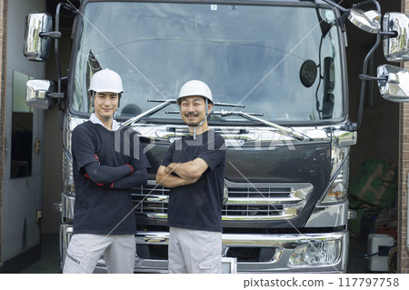 Worker in front of truck 117797758