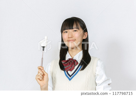 High school girl with a pointer High school girl with a pointer 117798715