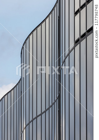 Wavy glass exterior of a building Wavy glass exterior of a building 117798748