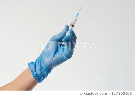 Hand Holding a Medical Syringe. High quality photo 117800106