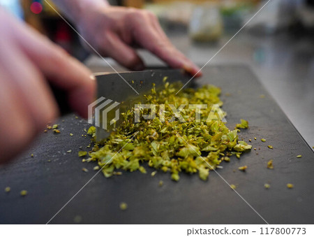 Hands chopping 117800773