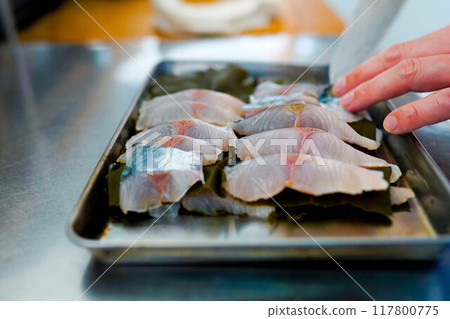 Sawara (Japanese mackerel) with kombu seaweed Sawara (Japanese mackerel) with kombu seaweed 117800775