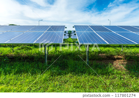 Photovoltaic solar power panel on dramatic sunset blue sky background, green clean Alternative power energy concept. 117801274