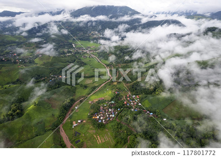 Landscape of Morning Mist with Mountain Layer at north of Thailand. mountain ridge and clouds in rural jungle bush forest Landscape of Morning Mist with Mountain Layer at north of Thailand. mountain ridge and clouds in rural jungle bush forest 117801772