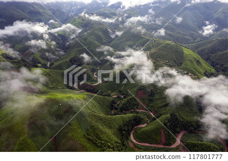 Landscape of Morning Mist with Mountain Layer at north of Thailand. mountain ridge and clouds in rural jungle bush forest 117801777