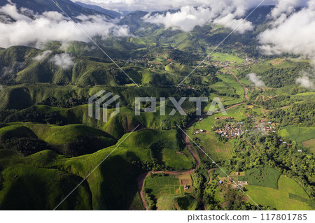 Landscape of Morning Mist with Mountain Layer at north of Thailand. mountain ridge and clouds in rural jungle bush forest Landscape of Morning Mist with Mountain Layer at north of Thailand. mountain ridge and clouds in rural jungle bush forest 117801785