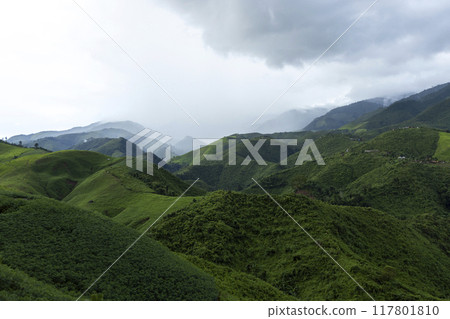 Landscape of Morning Mist with Mountain Layer at north of Thailand. mountain ridge and clouds in rural jungle bush forest 117801810