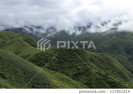 Landscape of Morning Mist with Mountain Layer at north of Thailand. mountain ridge and clouds in rural jungle bush forest Landscape of Morning Mist with Mountain Layer at north of Thailand. mountain ridge and clouds in rural jungle bush forest 117801814